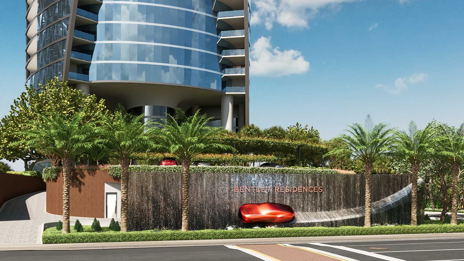 Muro cascada de entrada con escultura central de Bentley en Bentley Residences Sunny Isles Beach