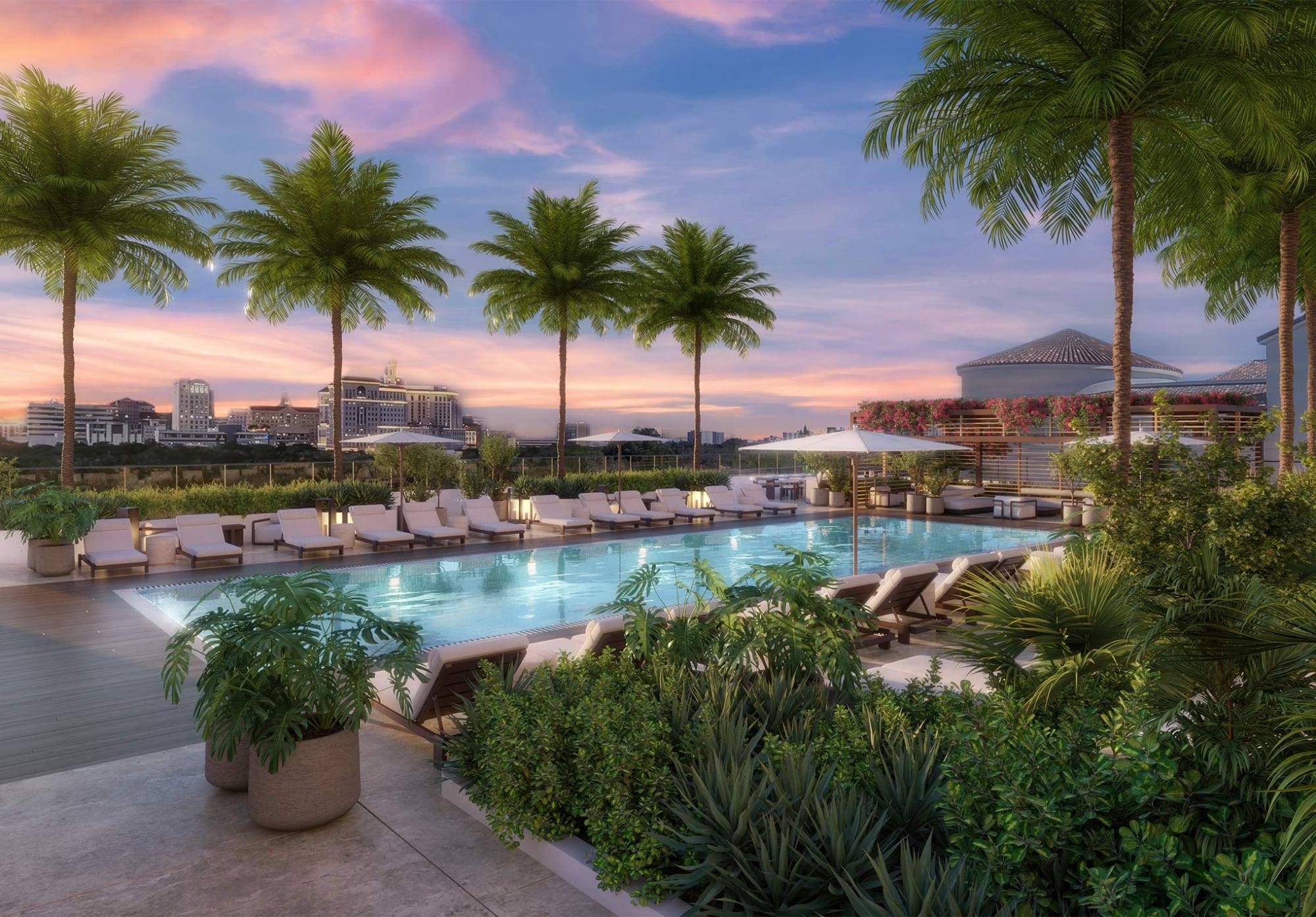 Rooftop pool and amenity deck rendering at Cassia Residences with views over Coral Gables at sunset
