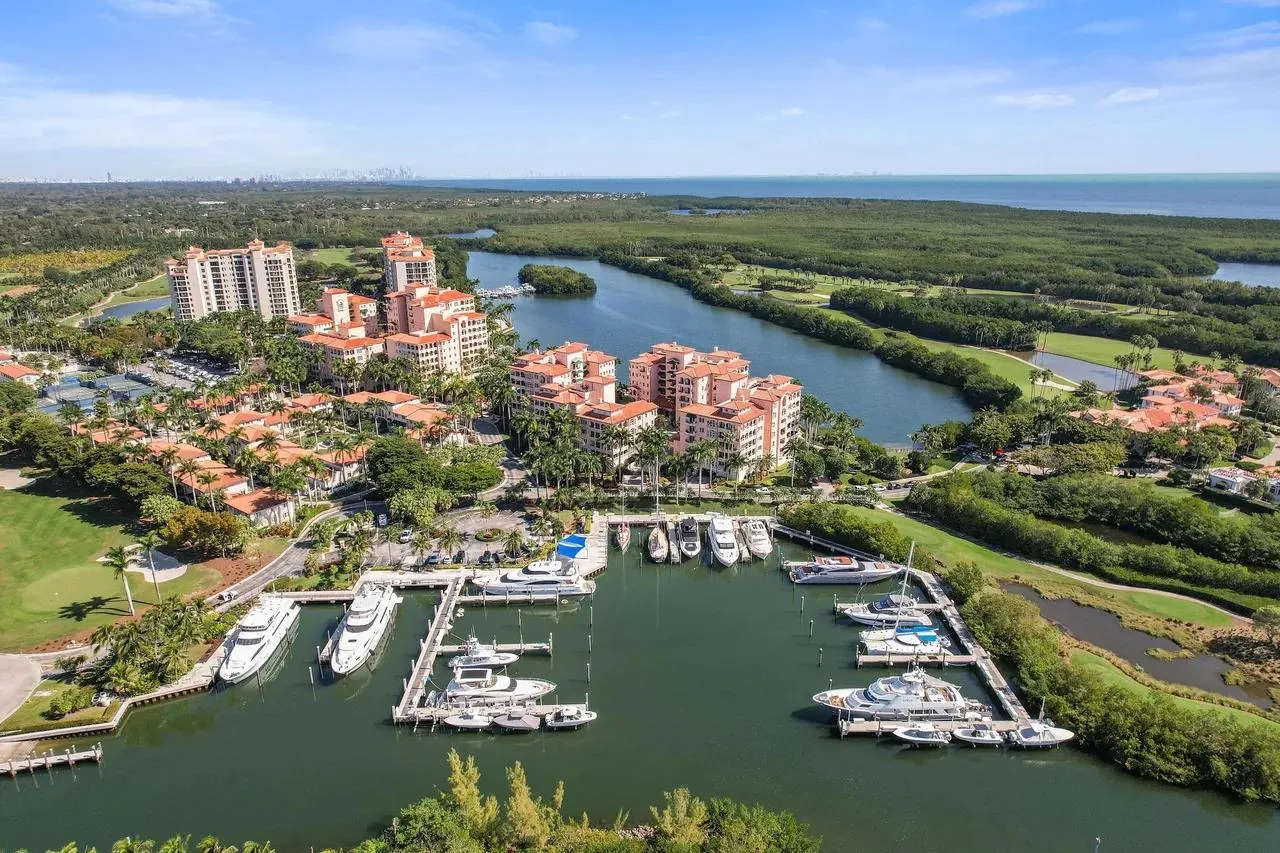 Aerial view of Deering Bay residences, marina and golf landscape in Coral Gables