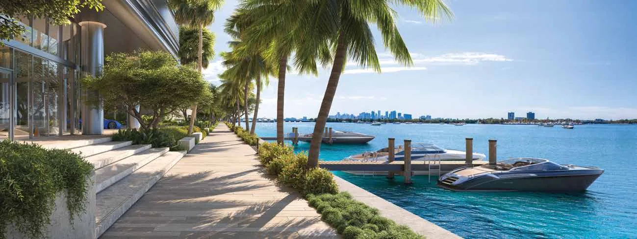Representación conceptual del artista de la marina privada y el paseo de 240 pies sobre Biscayne Bay en Pagani Residences, con amarres, palmeras y embarcaciones atracadas