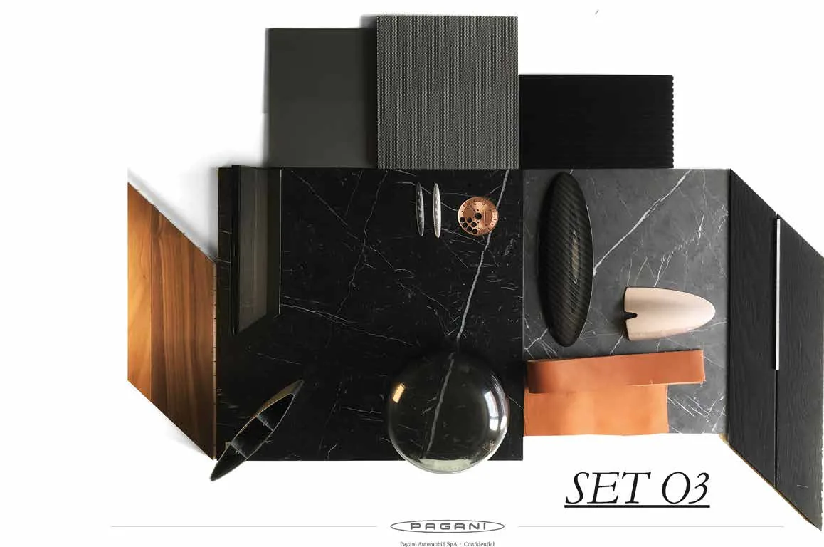 Paleta de materiales de Pagani Arte para Pagani Residences: travertino, mármol, cuero, textil tejido, chapa de madera, metal cepillado y fibra de carbono dispuestos en conjunto