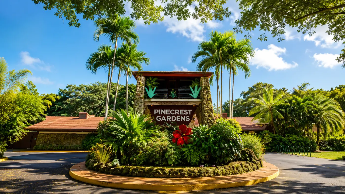 The entrance to Pinecrest Gardens, the Village of Pinecrest municipal park on the historic Parrot Jungle site, framed by royal palms and tropical planting