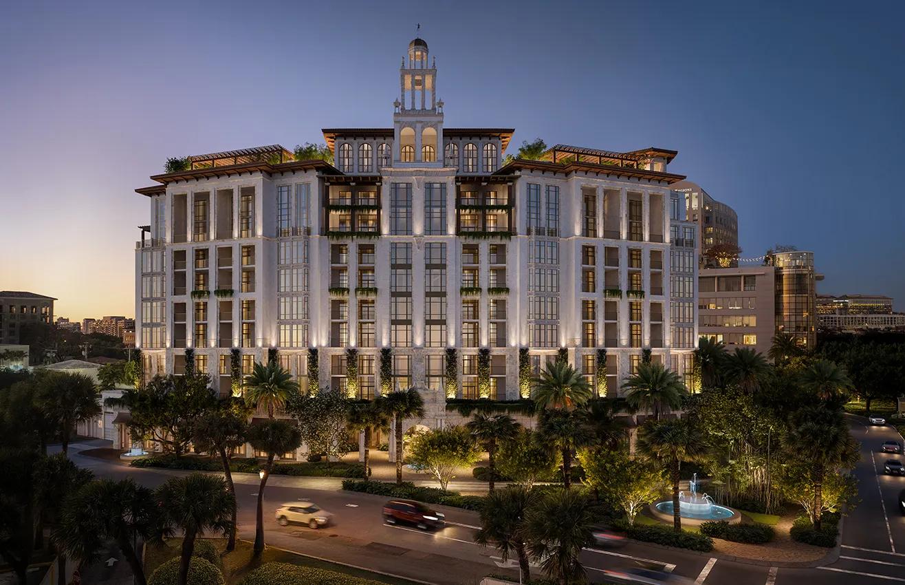 Render exterior al atardecer de Ponce Park Residences, un condominio de 11 pisos de inspiraci&oacute;n mediterr&aacute;nea en Ponce de Leon Boulevard, Coral Gables, Florida