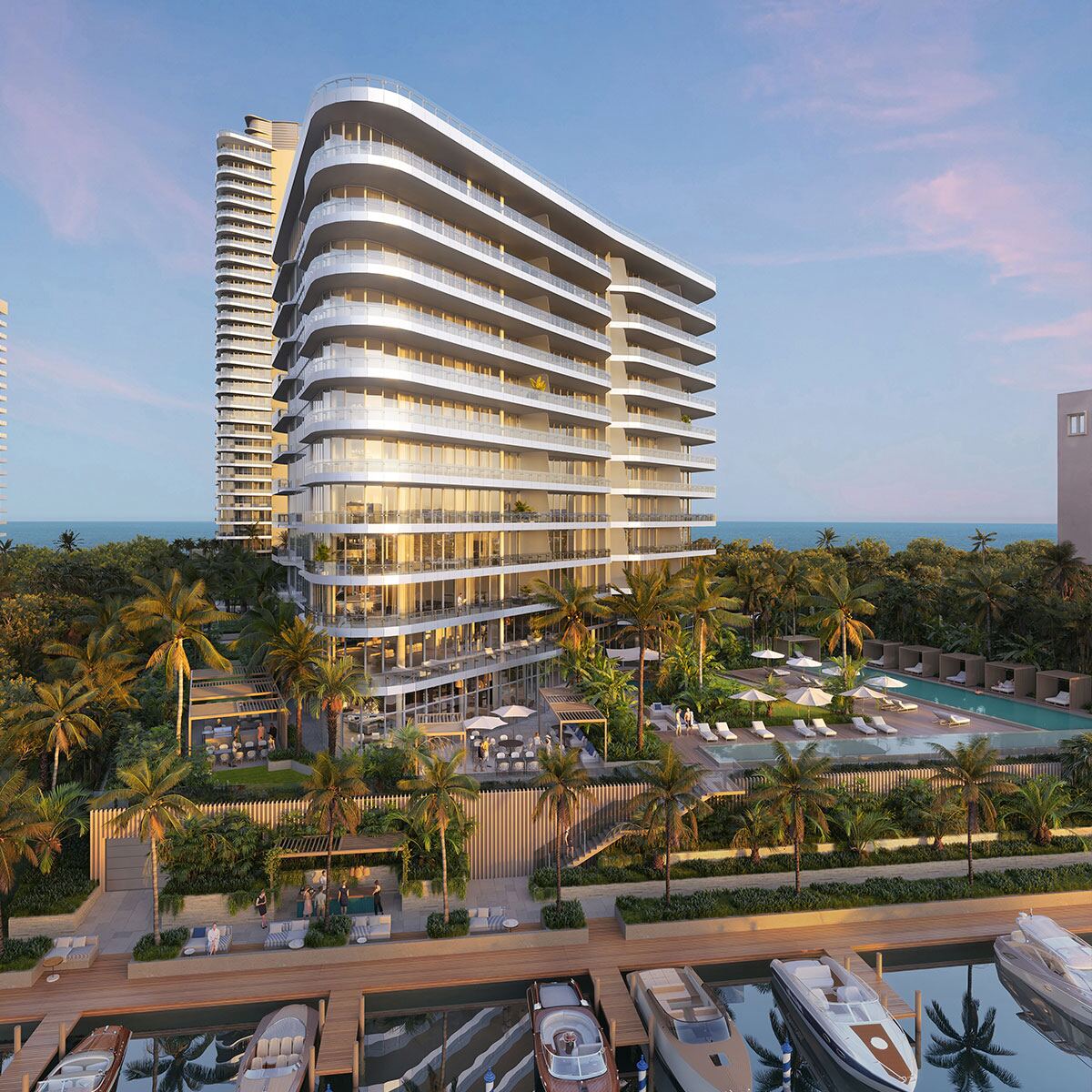 Torre Marina de The Ritz-Carlton Residences Pompano Beach al atardecer con muelles privados en el Intracoastal