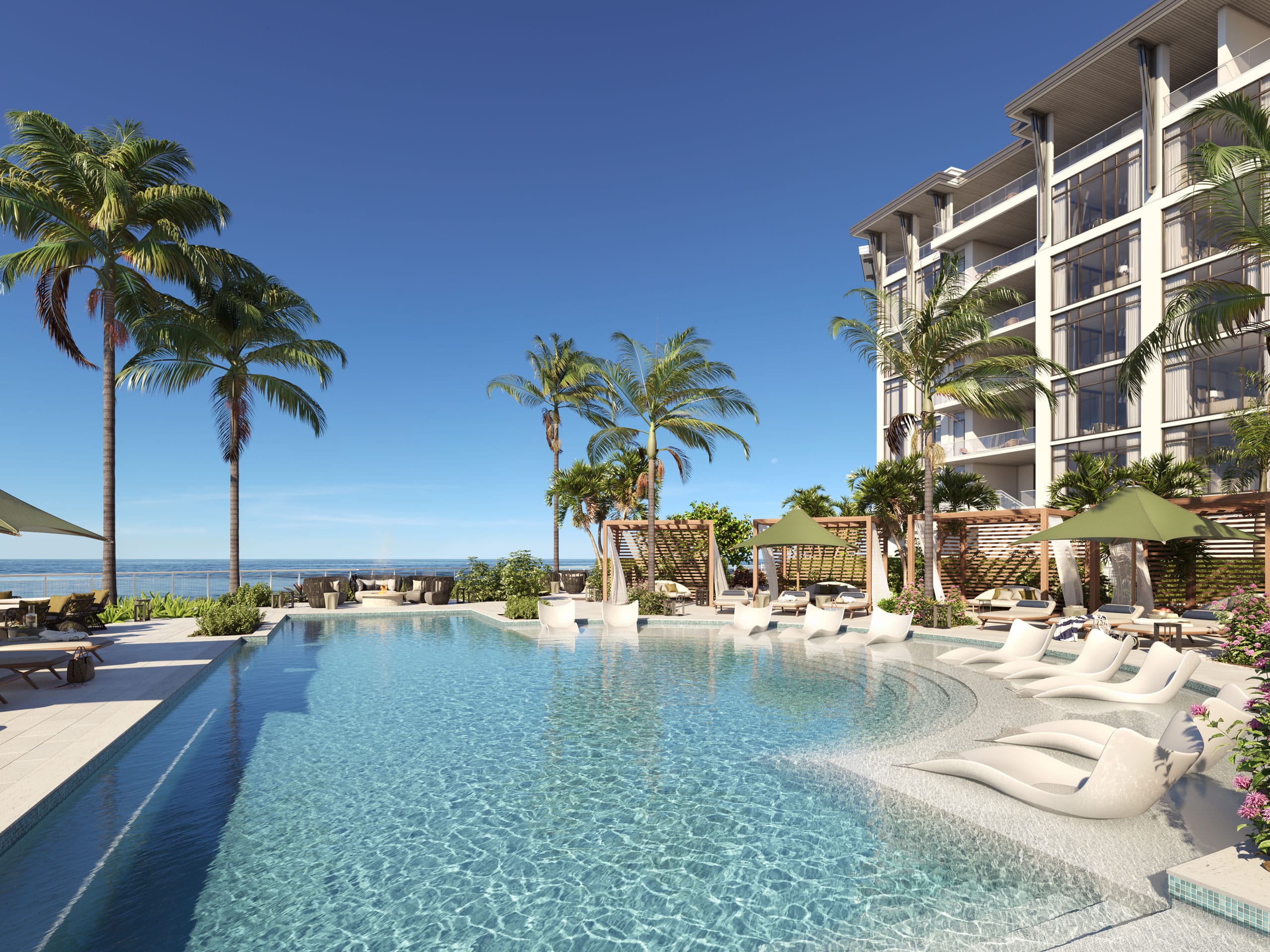 Terraza de piscina estilo resort frente a la playa con tumbonas, cabanas y palmeras con vista al Golfo de M&eacute;xico en Rosewood Residences Naples, Coquina Sands, Naples, Florida