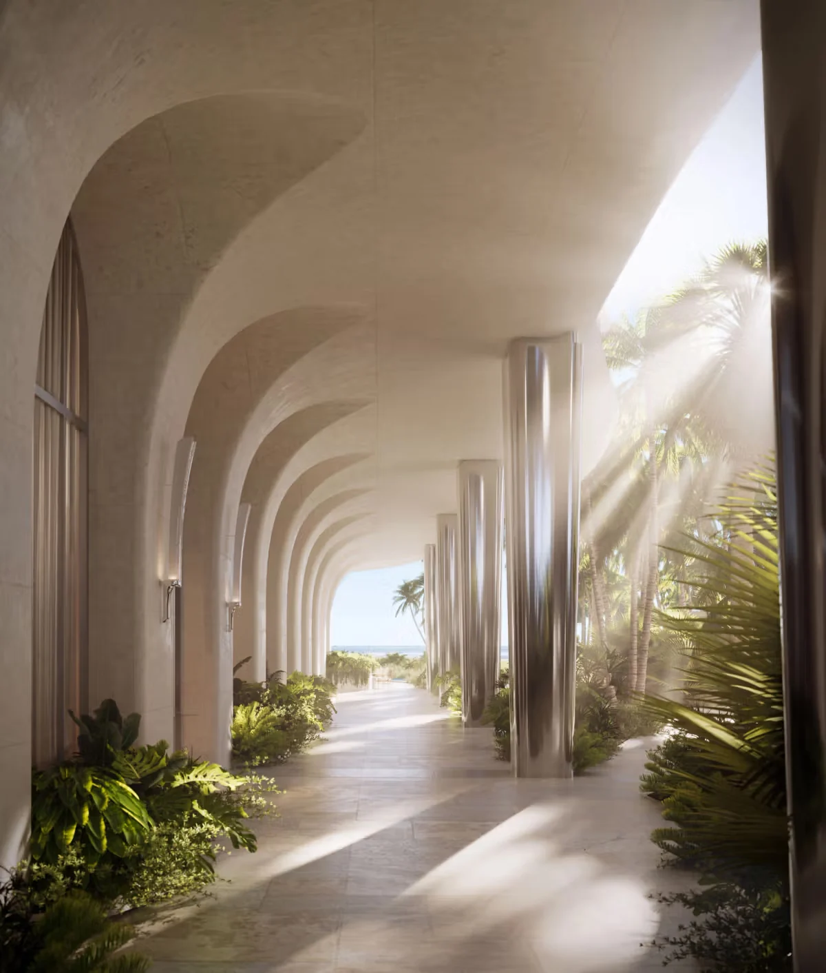 Rendering of an arched stone colonnade walkway at Shore Club Private Collection, opening toward planting and the ocean beyond