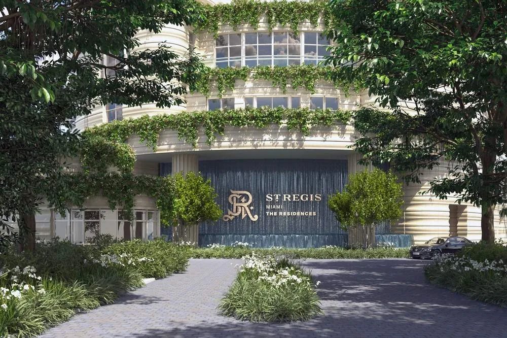 The arrival entrance of the St Regis Residences Miami sales experience with signature water wall &mdash; artist's conceptual rendering