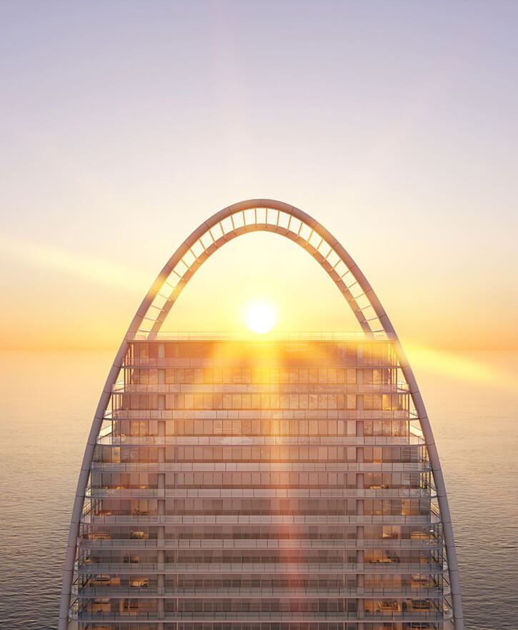 Signature arched crown of The St. Regis Residences Sunny Isles Beach framing the sunrise over the Atlantic