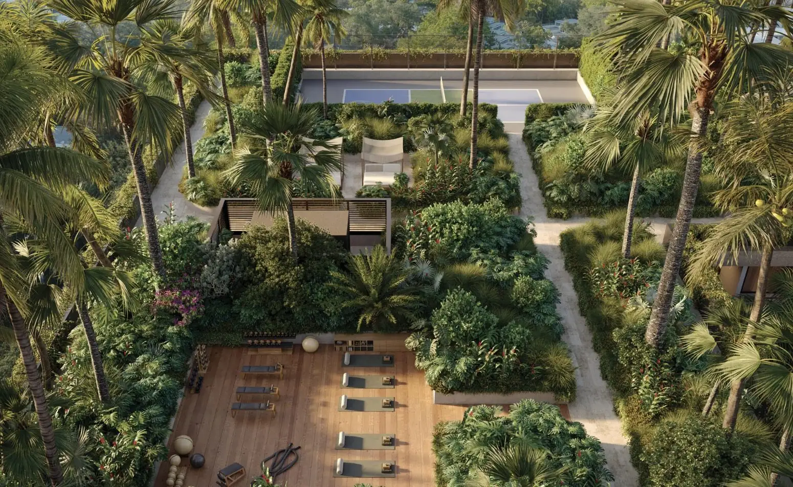 Aerial view of the wellness garden and outdoor fitness deck at THE WELL Residences, Coconut Grove framed by palms (artist's conceptual rendering)