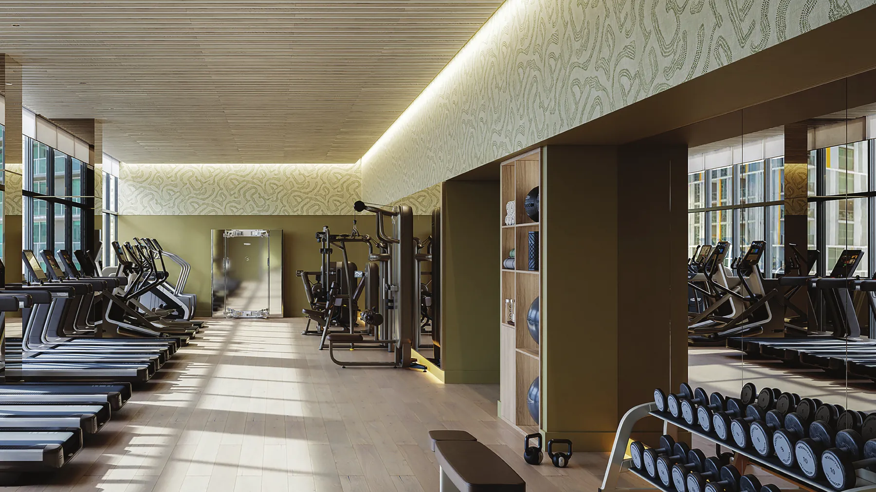 Artist's conceptual rendering of the fitness and wellness center at Viceroy Brickell with cardio theater overlooking the Miami skyline