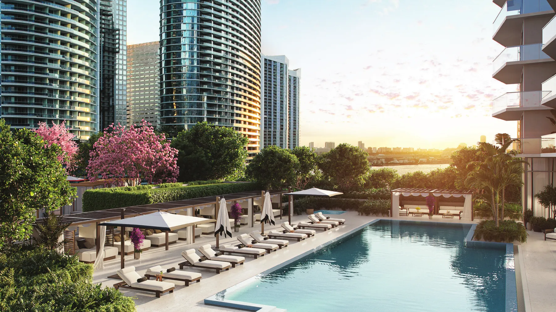 Artist's conceptual rendering of the elevated 14th-level resort pool deck at Viceroy Brickell with heated pool, cabanas and Brickell skyline