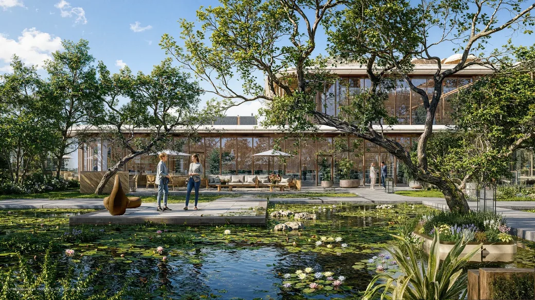 Patio ajardinado con estanque de nenúfares y pabellón de vidrio, en una representación conceptual de un desarrollo residencial orientado al bienestar en el sur de Florida